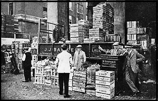 Members of the Barker family, farmers of Laleham on Thames, selling their produce at Covent Garden market.