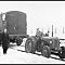 Gordon Dennett, manager of the Bracknell branch, pulling a railway truck at Bracknell Station during severe weather in 1963.